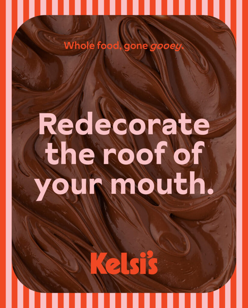 Swirled chocolate from Kelsi's brownie batter over top of a striped background.